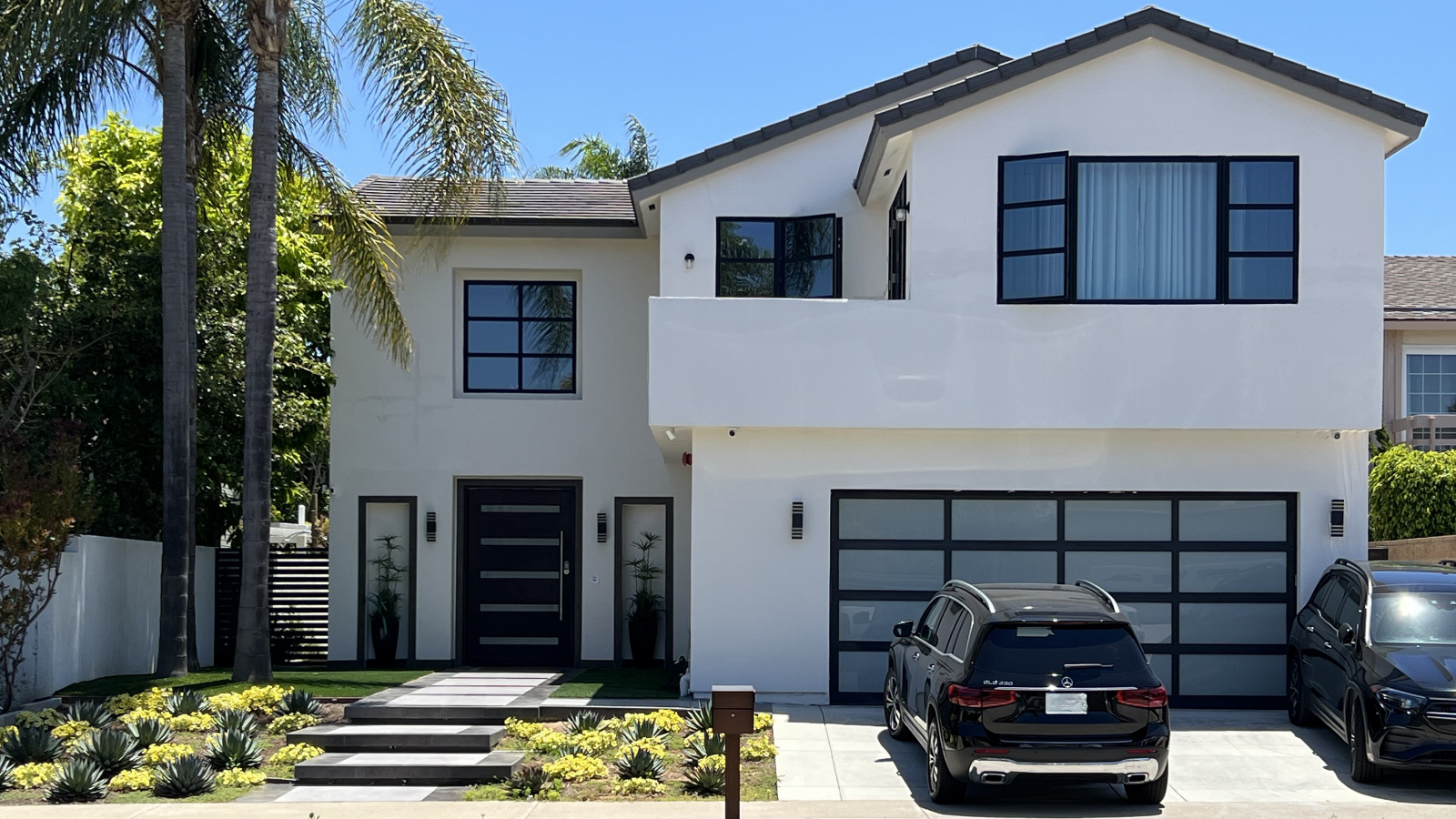 Two-story Mediterranean custom home built by Newport Construction Group