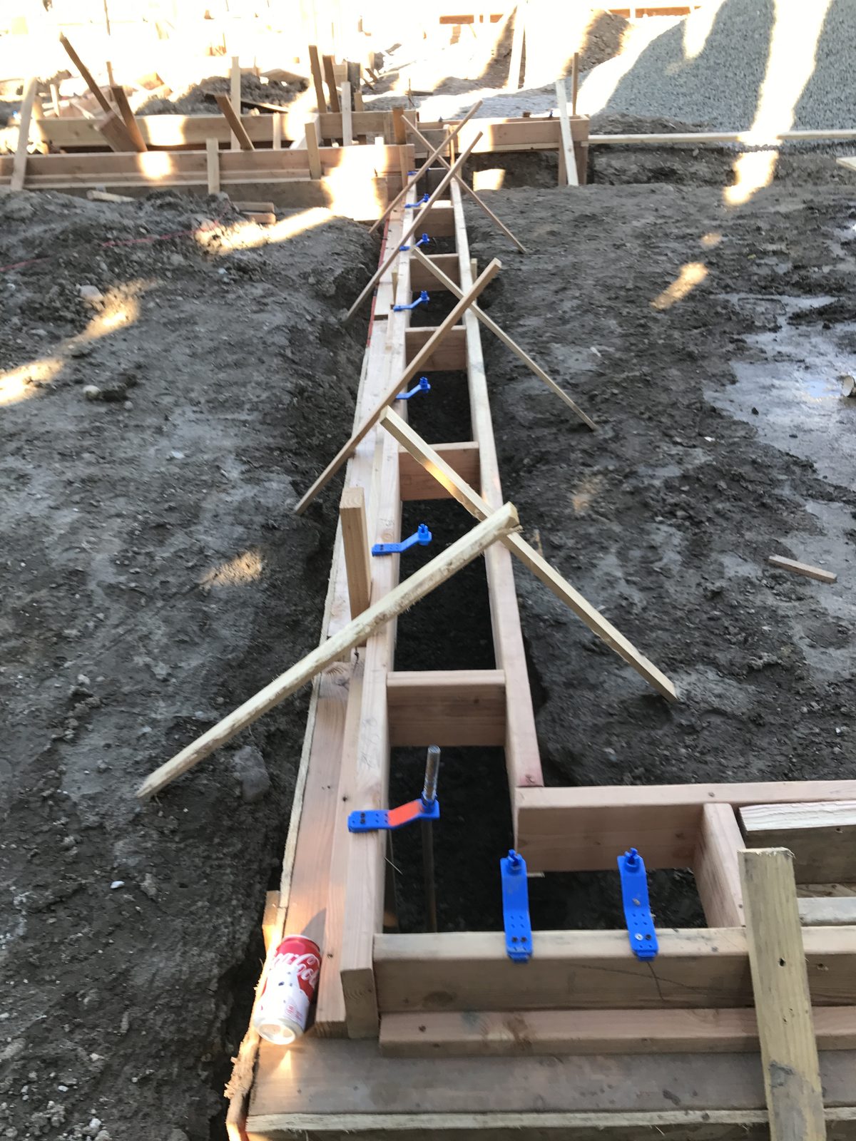 Precision wood foundation forms and rebar staking by Newport Construction Group