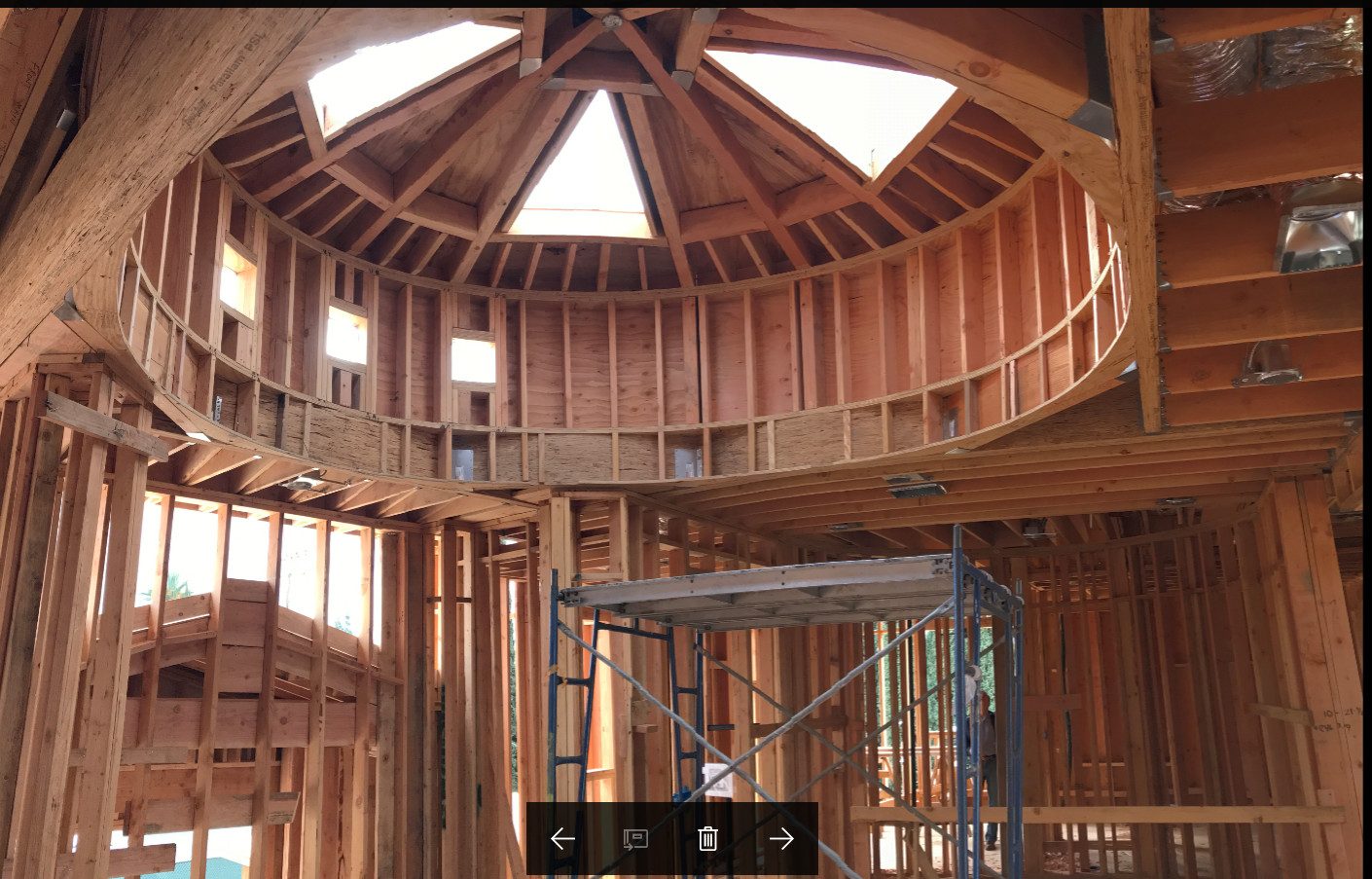 Complex interior ceiling and rotunda tower framing by Newport Construction Group civil engineers