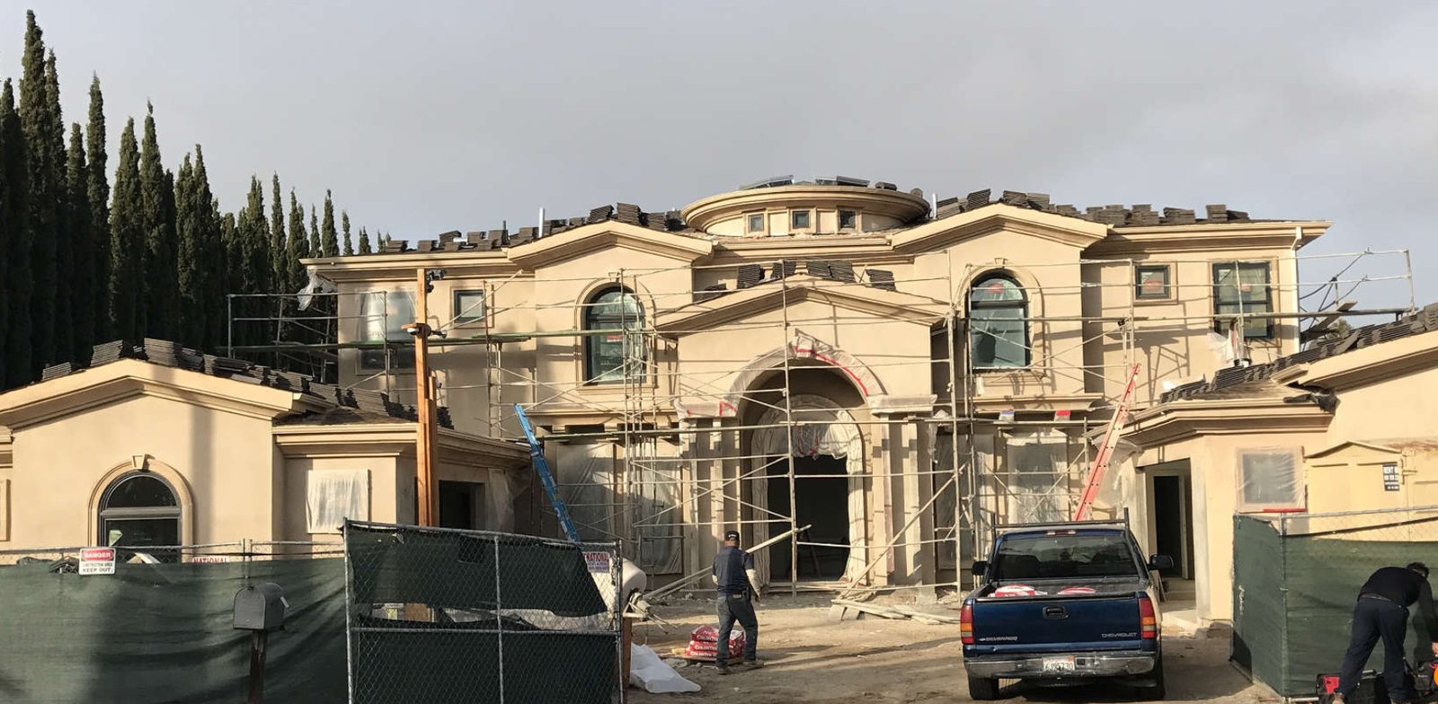 Exterior stucco application and finishing on a luxury custom home by Newport Construction Group in Villa Park, CA