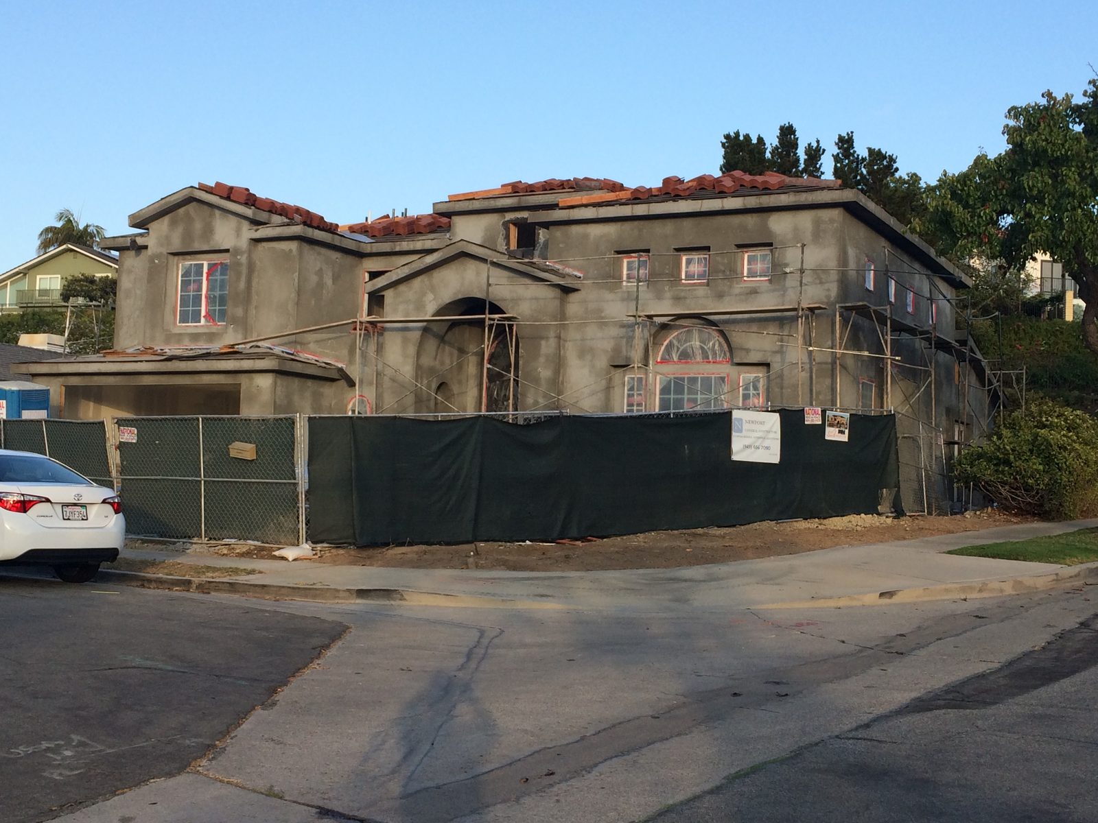 Exterior plaster and brown coat stucco application by Newport Construction Group in Villa Park